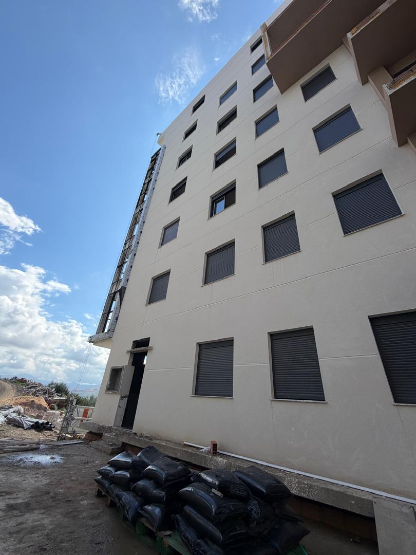 Façade latérale — ravalement et vitrages